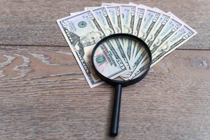 magnifier on dollars - best joint replacement surgeons in Portsmouth, New Hampshire