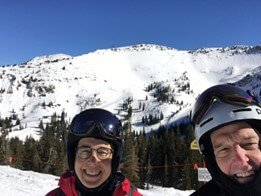 two people on mountain skiing - best conformis knee replacement surgeons in New Hampshire