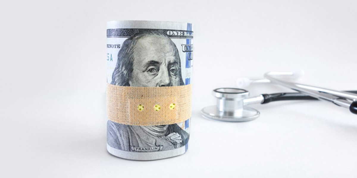 money wrapped near stethoscope - top rated joint replacement surgeons in Portsmouth, New Hampshire