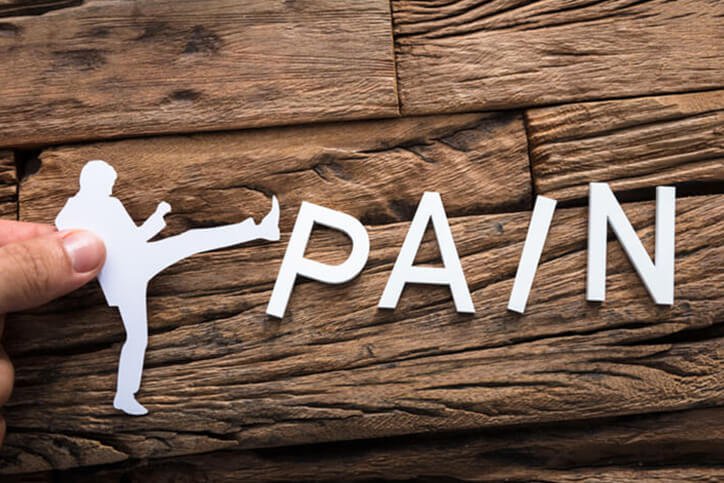 paper man kicking pain word - best shoulder replacement surgeons in Portsmouth, New Hampshire